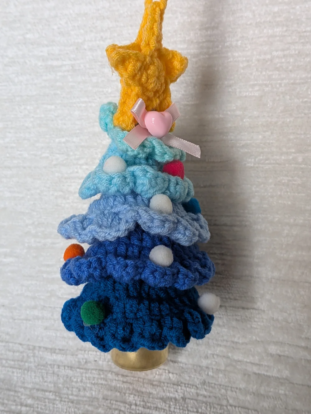 Crocheted Blue Layered Tree Ornament with Yellow Star And Bell
